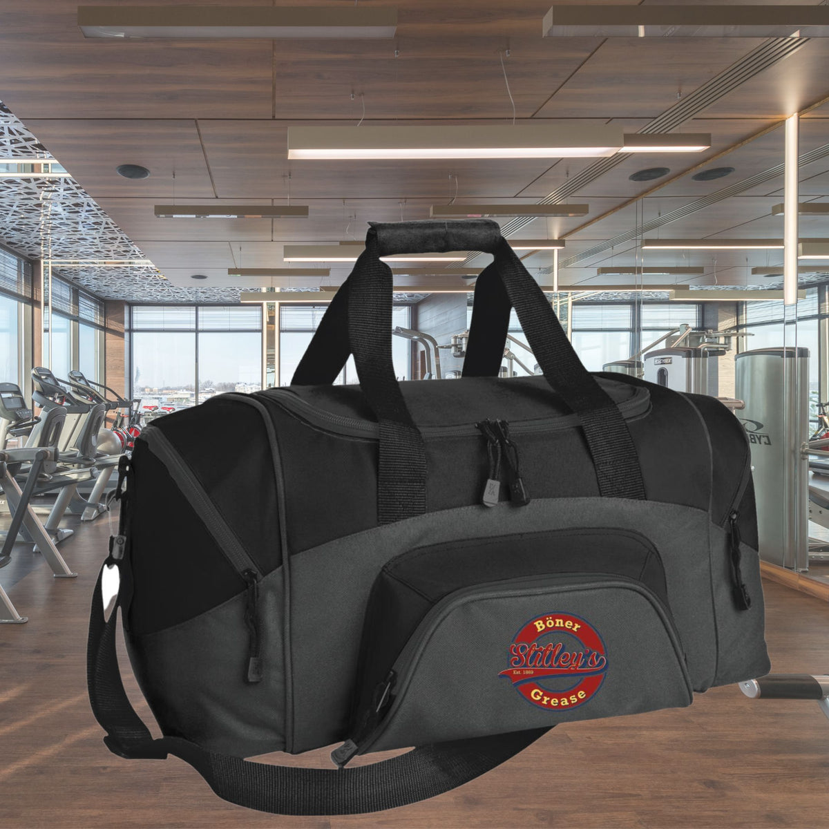 Stitley's small gray duffel is perfect for spin class